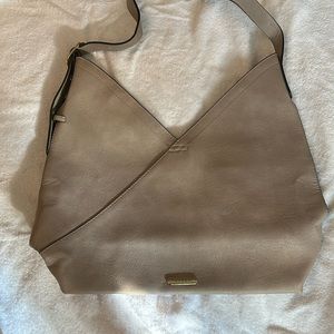 Vegan leather handbag with adjustable strap